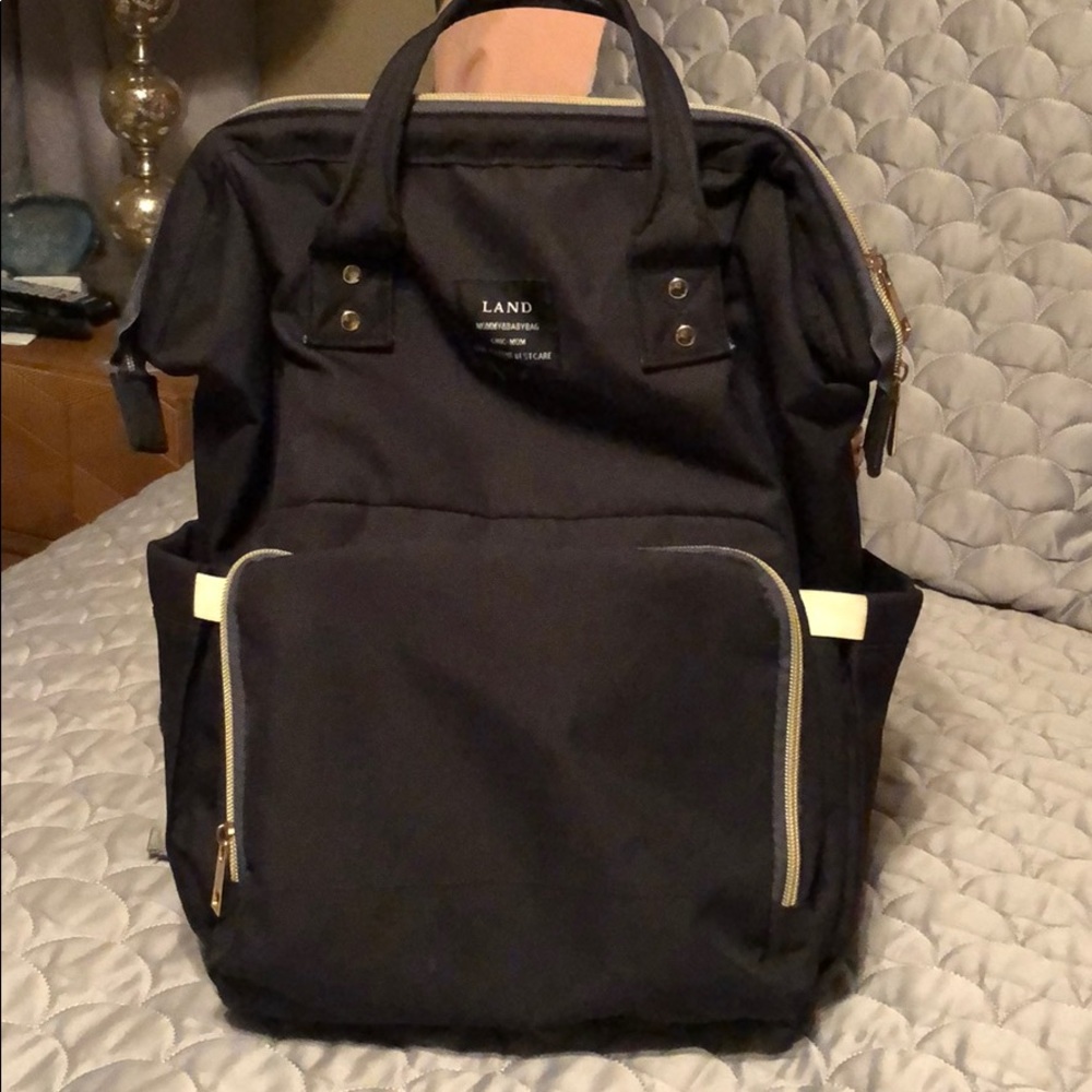 Diaper or breast pump backpack.